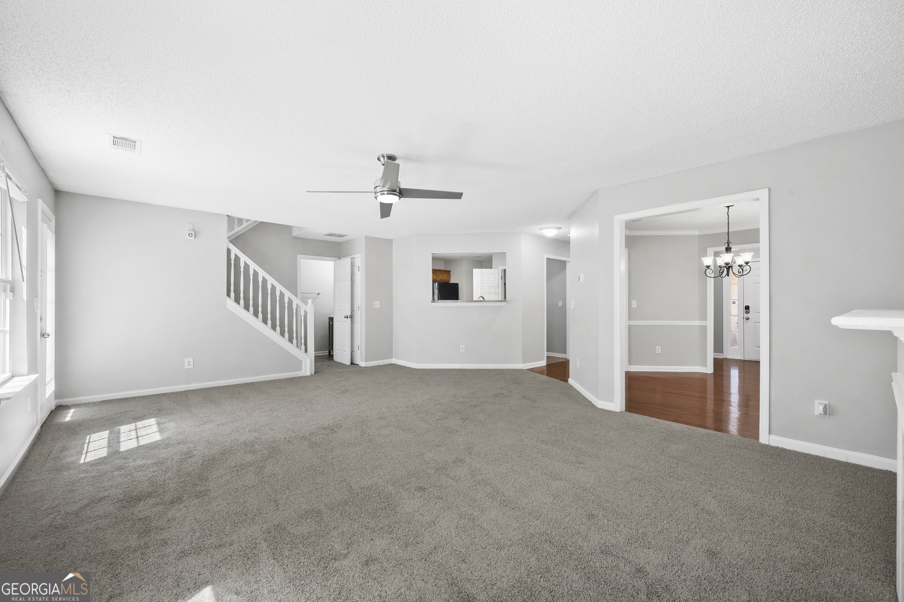 1883 Simmons Lane Hampton, GA 30228 - Photo 9 of 28 a view of a livingroom with a staircase