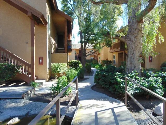 a view of yard with patio