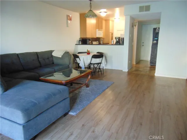 a couple of potted plants in front of door