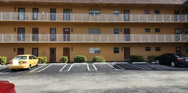 a car parked in front of a building