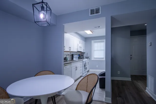 a view of a dining room with furniture