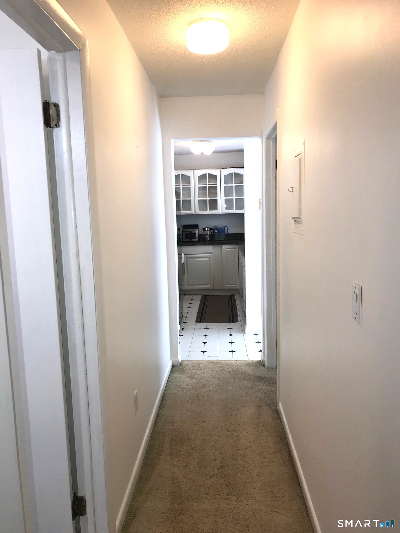 175 Mill Pond Road, Unit 346 Hamden, CT 06514 - Photo 9 of 18 a view of a hallway