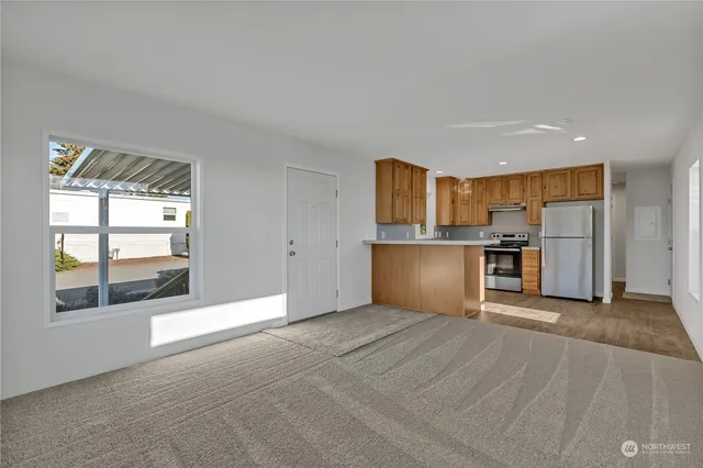 a view of a kitchen with a stove cabinets and a kitchen