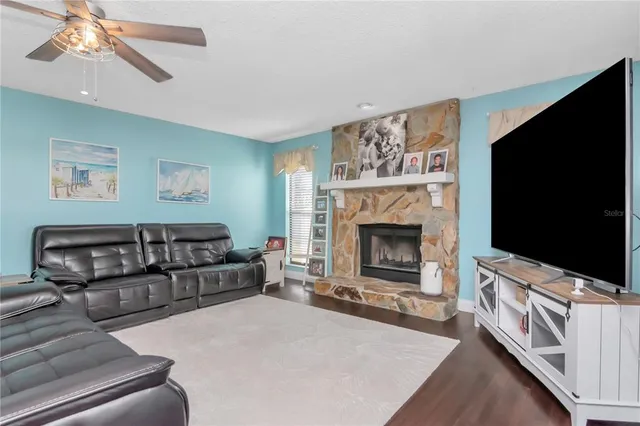 a bathroom with a sink mirror vanity and toilet