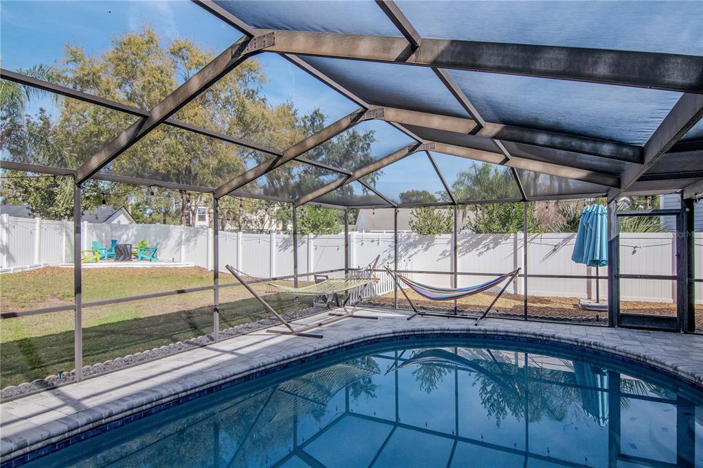 2604 Goldcrest Place Valrico, FL 33596 - Photo 35 of 72 a view of a backyard with a sink and glass windows