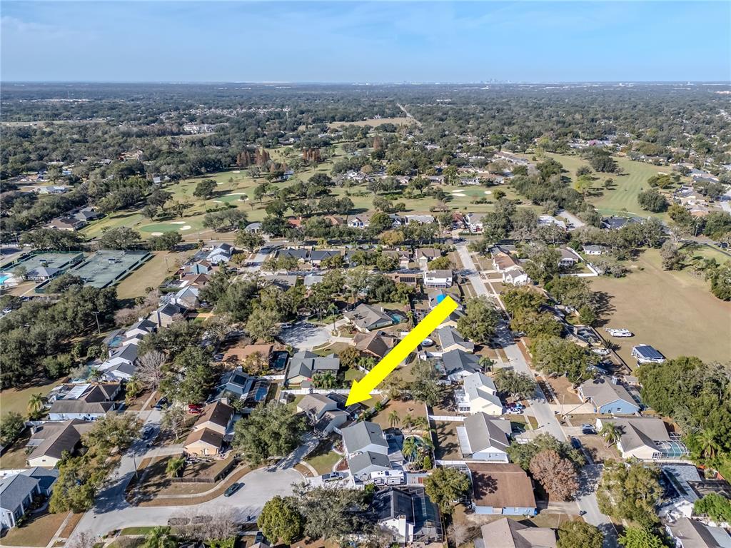 2604 Goldcrest Place Valrico, FL 33596 - Photo 58 of 72 an aerial view of a city with lots of residential buildings