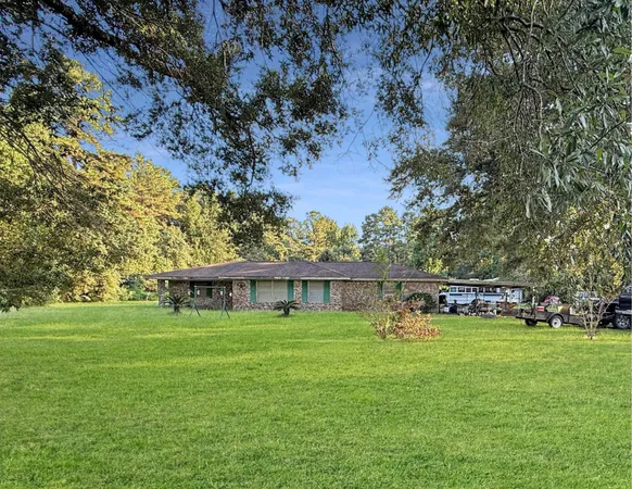 a view of a house with a big yard