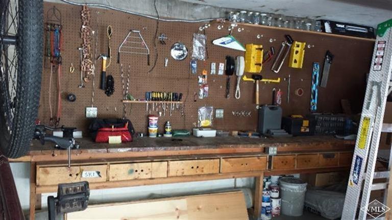 2821 Kinnickinnick Road, Unit 1C Vail, CO 81657 - Photo 16 of 21 great man-cave and workbench. loads of s
