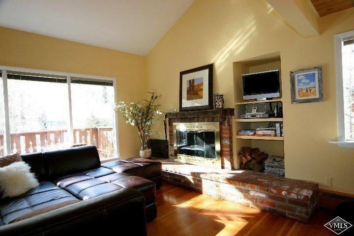 2821 Kinnickinnick Road, Unit 1C Vail, CO 81657 - Photo 2 of 21 Wonderful vaulted ceilings, wood firepla