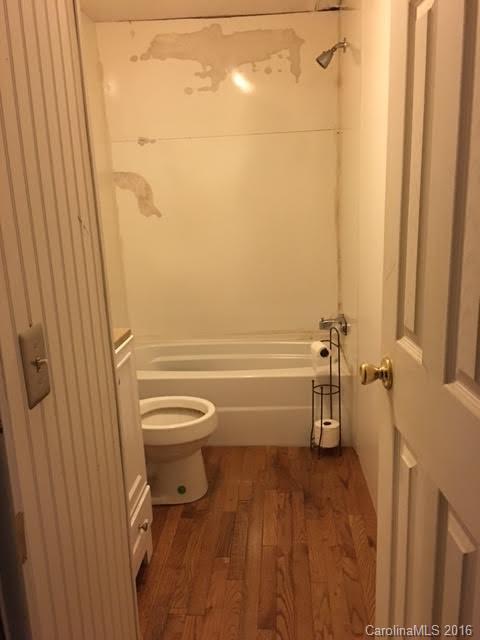 339 Mamie Hamilton Road Bostic, NC 28018 - Photo 7 of 8 a bathroom with a toilet and a shower