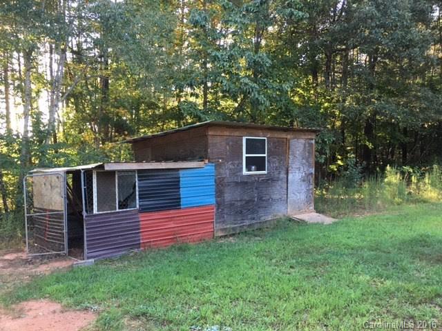 339 Mamie Hamilton Road Bostic, NC 28018 - Photo 8 of 8 a backyard of a house with seating space