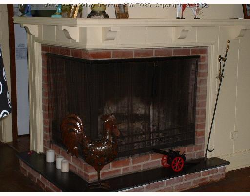 Other. Two-sided fireplace to be enjoyed in the living and dining rooms.