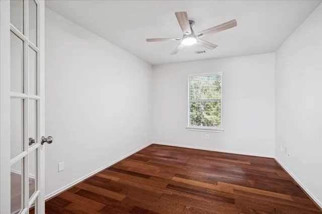 a bathroom with a tub sink double and mirror