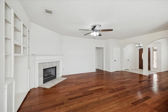 a view of a livingroom with wooden floor