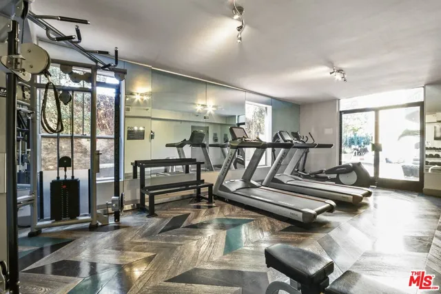a view of a room with gym equipment