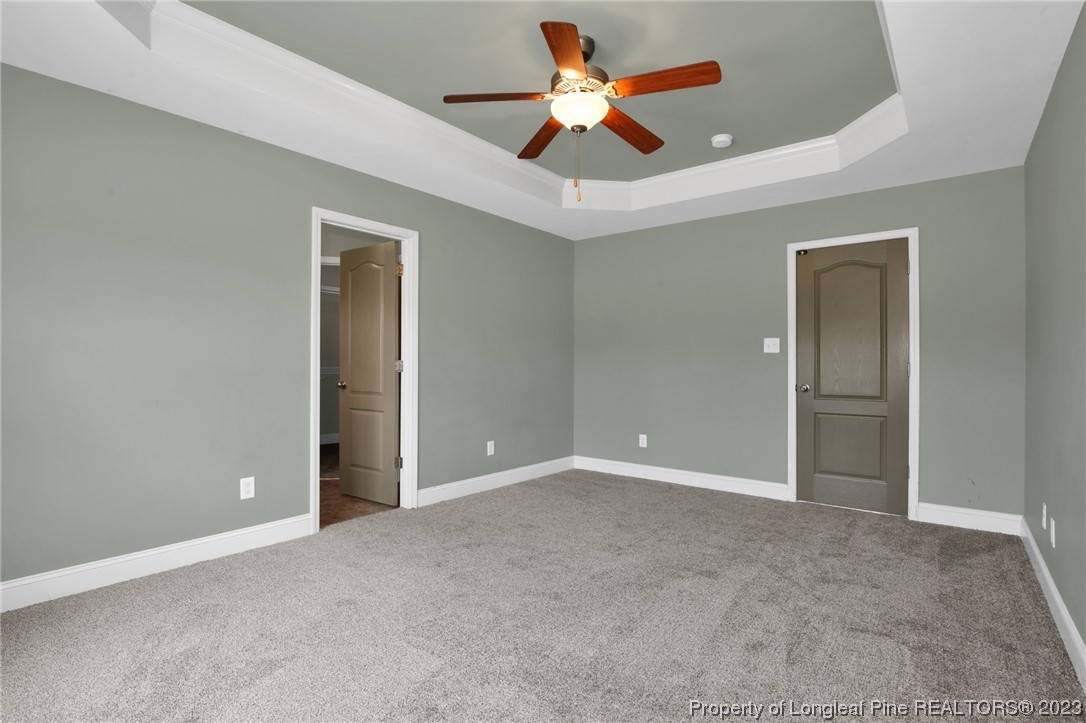 159 Boswell Street Raeford, NC 28376 - Photo 18 of 34 an empty room and closet area with fan