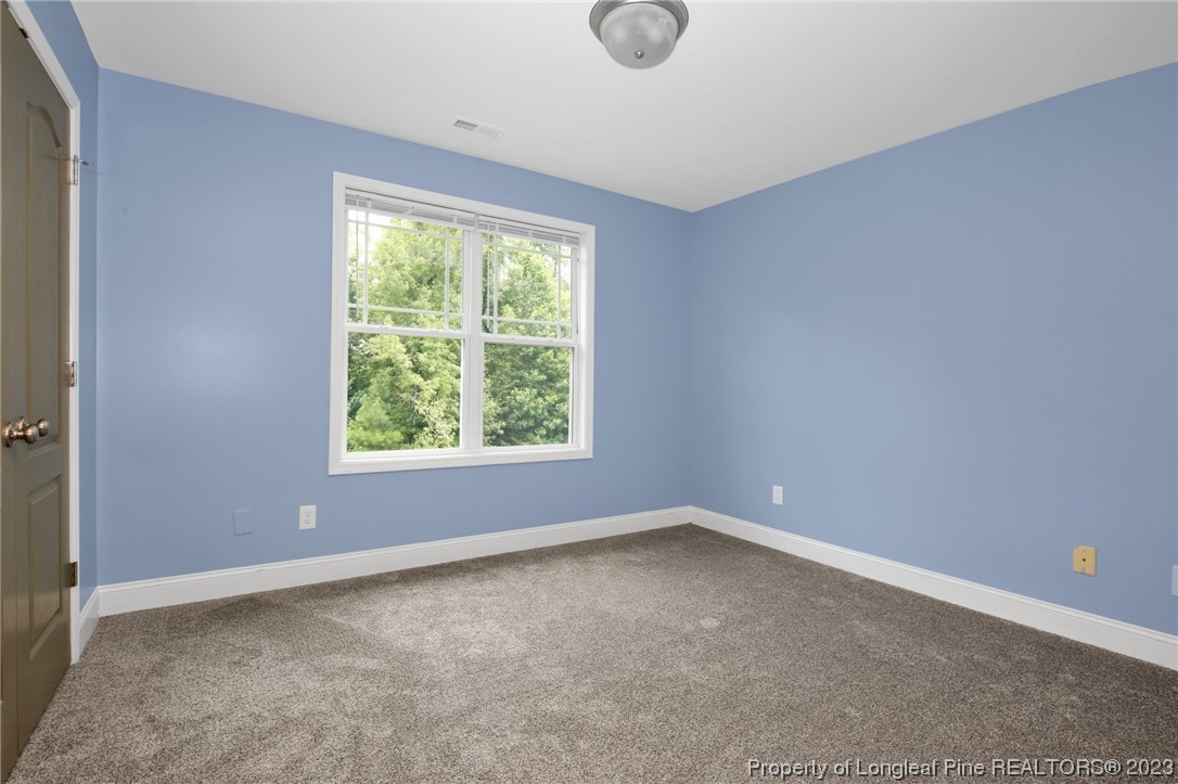 159 Boswell Street Raeford, NC 28376 - Photo 22 of 34 an empty room with a window