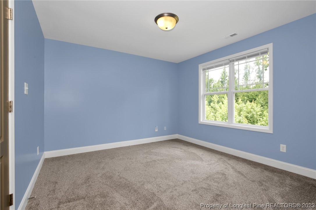 159 Boswell Street Raeford, NC 28376 - Photo 24 of 34 an empty room with a window