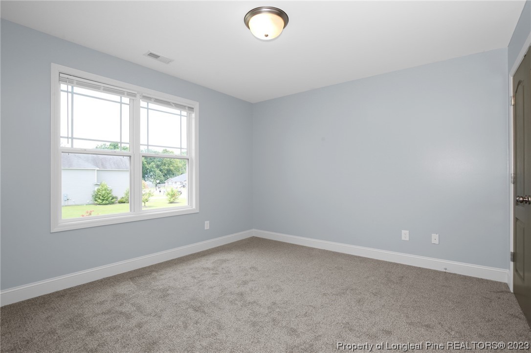 159 Boswell Street Raeford, NC 28376 - Photo 26 of 34 an empty room with a window