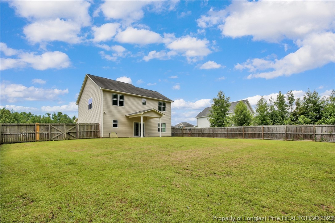 159 Boswell Street Raeford, NC 28376 - Photo 32 of 34 a view of a house with a yard