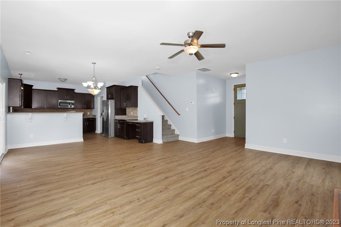 159 Boswell Street Raeford, NC 28376 - Photo 8 of 34 a view of a kitchen with a sink and a kitchen