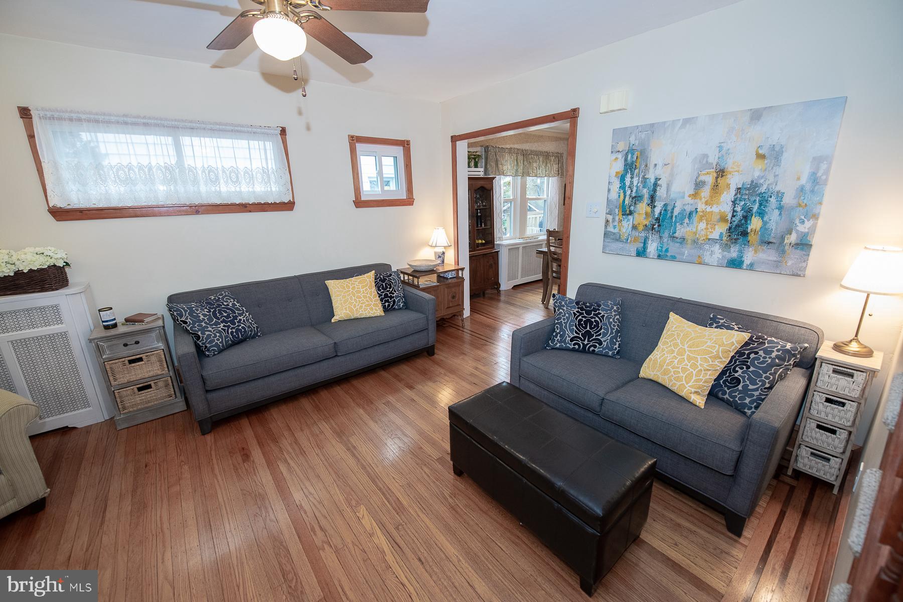 560 Wales Road Havertown, PA 19083 - Photo 12 of 69 a living room with furniture and wooden floor