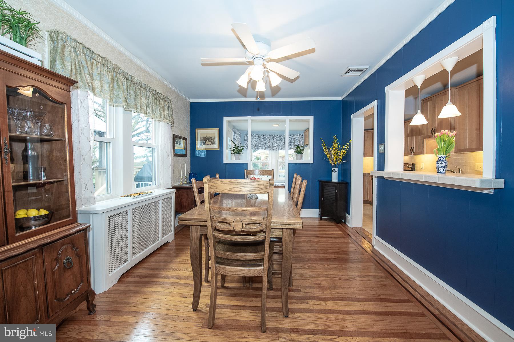 560 Wales Road Havertown, PA 19083 - Photo 17 of 69 a view of a dining room with furniture a chandelier and wooden floor