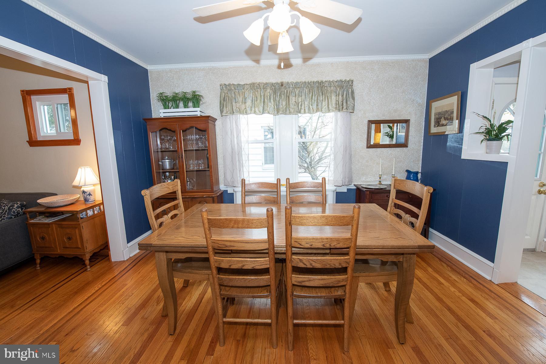 560 Wales Road Havertown, PA 19083 - Photo 18 of 69 a view of a dining room with furniture wooden floor and chandelier