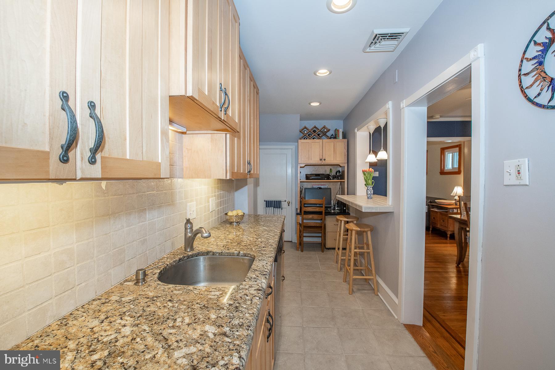560 Wales Road Havertown, PA 19083 - Photo 29 of 69 a kitchen with a sink and a refrigerator