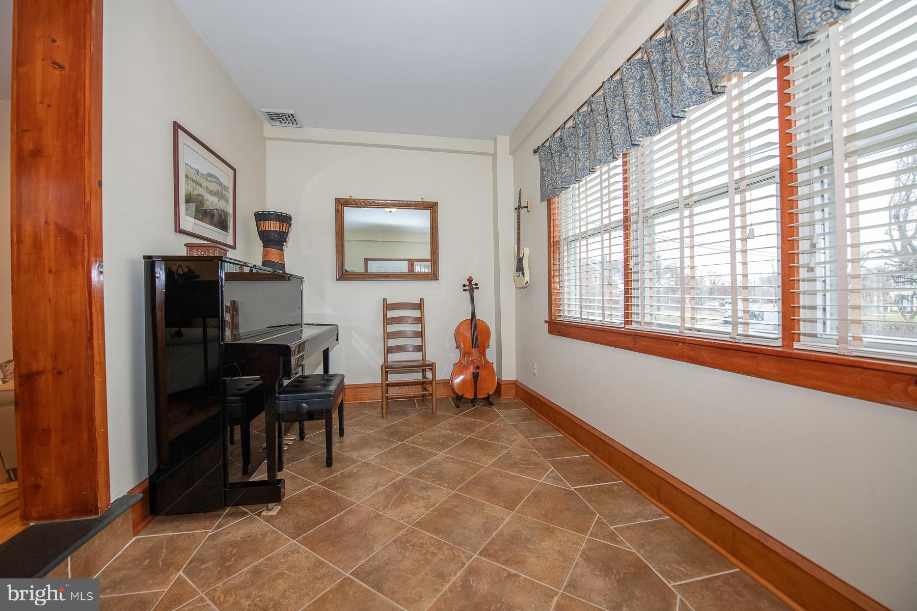 560 Wales Road Havertown, PA 19083 - Photo 5 of 69 a view of a livingroom with workspace and a window