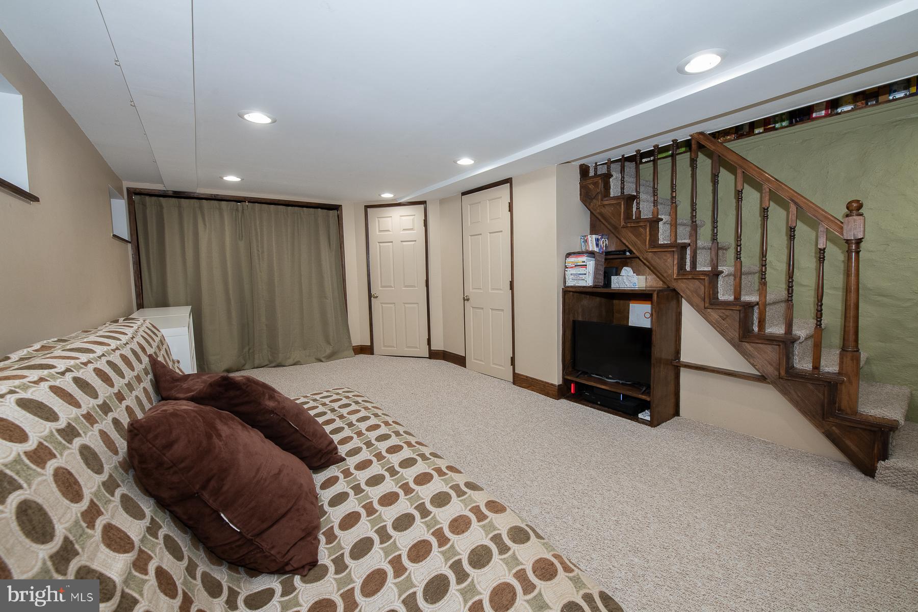 560 Wales Road Havertown, PA 19083 - Photo 50 of 69 a bedroom with a bed and a walk in closet