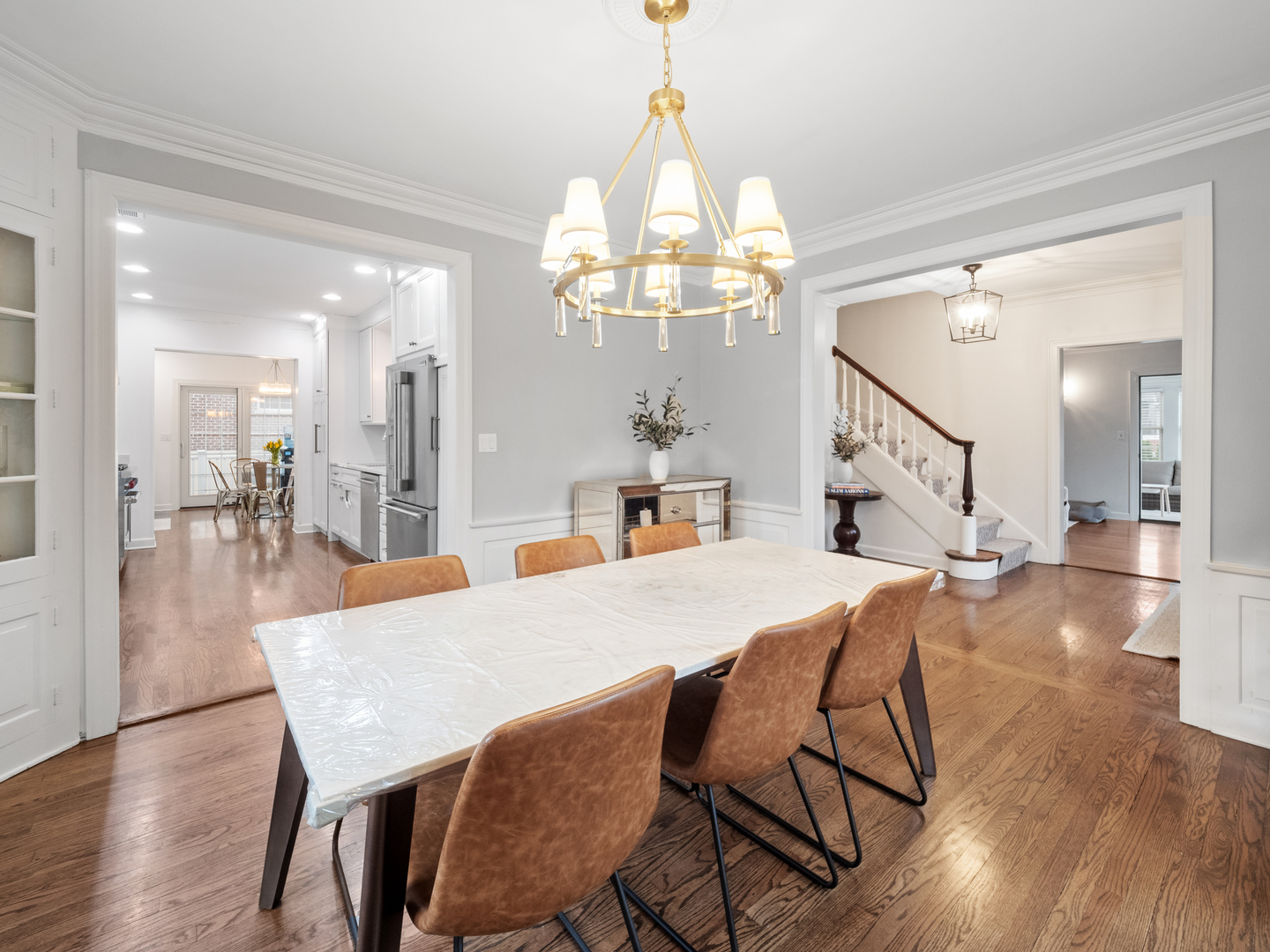 530 Grand Boulevard Park Ridge, IL 60068 - Photo 15 of 55 a view of a dining room with furniture and a chandelier