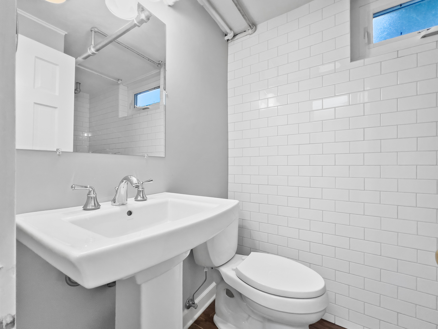 530 Grand Boulevard Park Ridge, IL 60068 - Photo 42 of 55 a bathroom with a sink a toilet and mirror