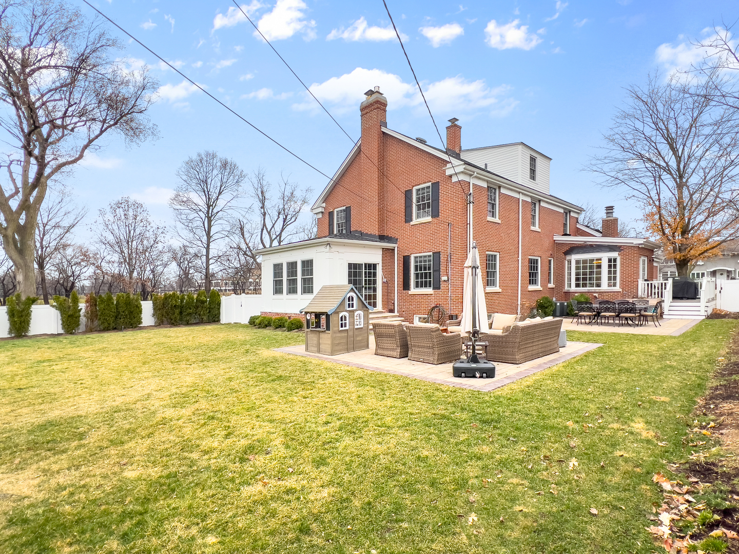 530 Grand Boulevard Park Ridge, IL 60068 - Photo 45 of 55 a view of a house with a yard patio and fire pit