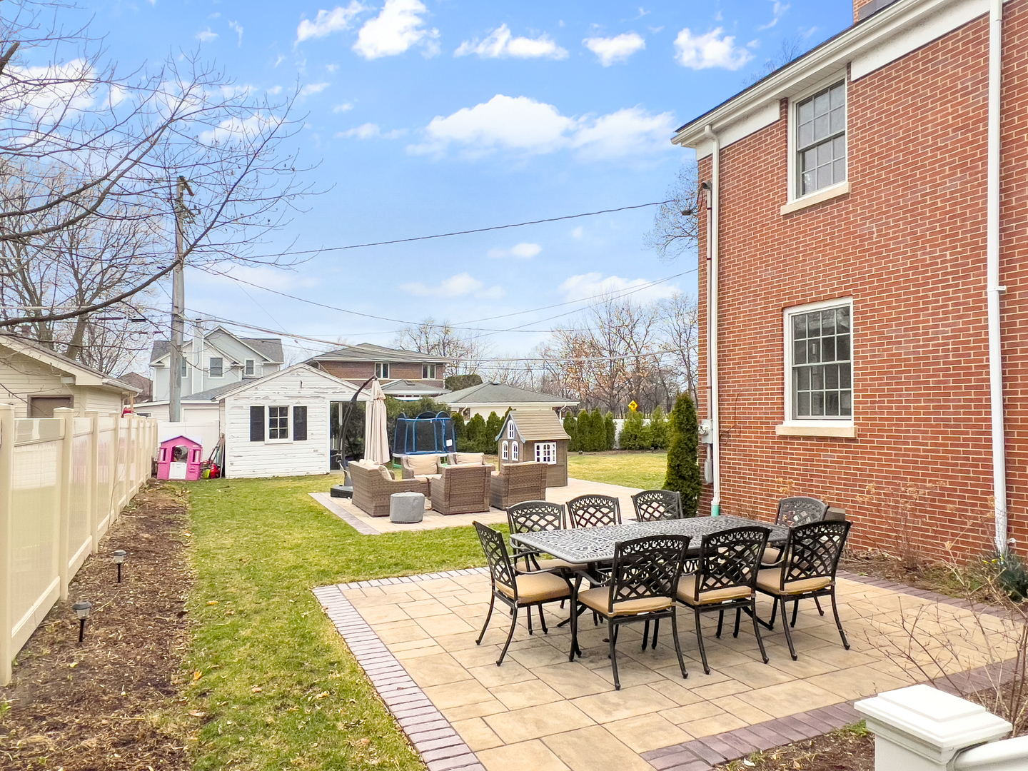 530 Grand Boulevard Park Ridge, IL 60068 - Photo 48 of 55 a view of a patio with couches table and chairs and potted plants
