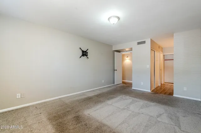 an empty room with a natural light