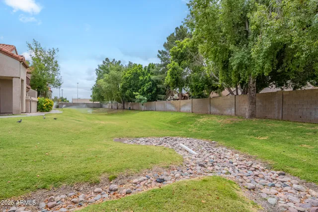a view of a house with a big yard