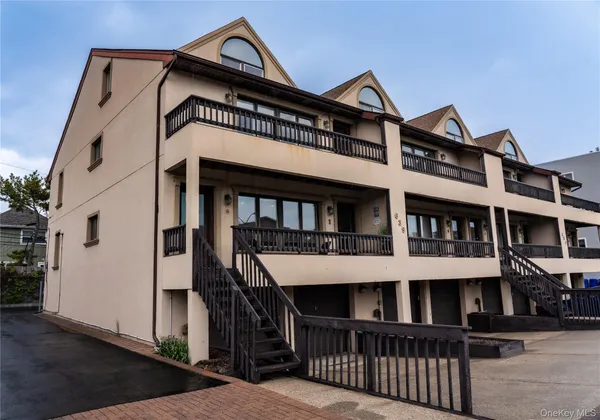 a front view of a house with a balcony