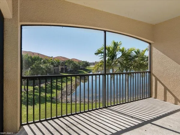 a balcony with wooden floor