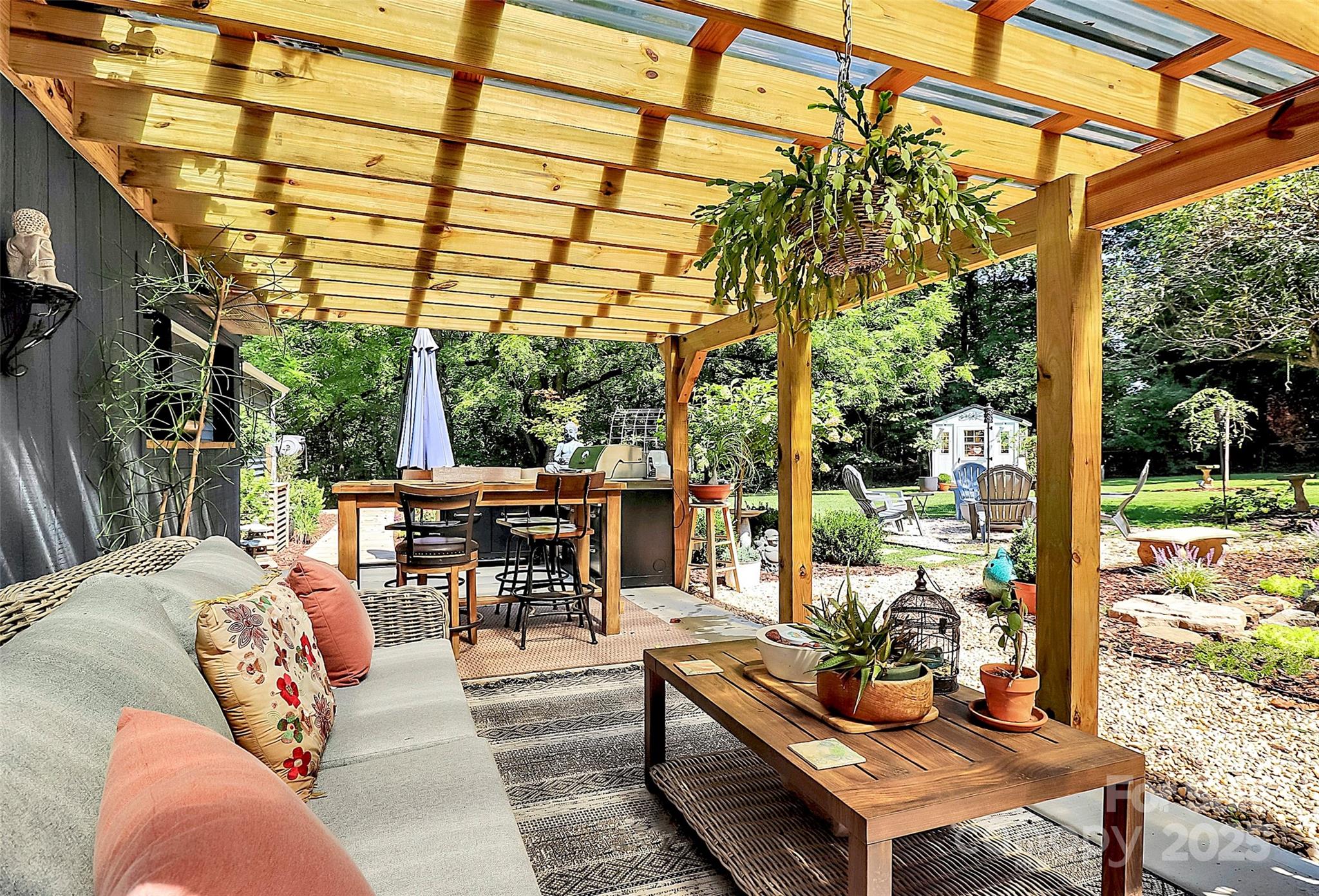 205 Mason Street Belmont, NC 28012 - Photo 21 of 27 a outdoor living space with furniture and garden view
