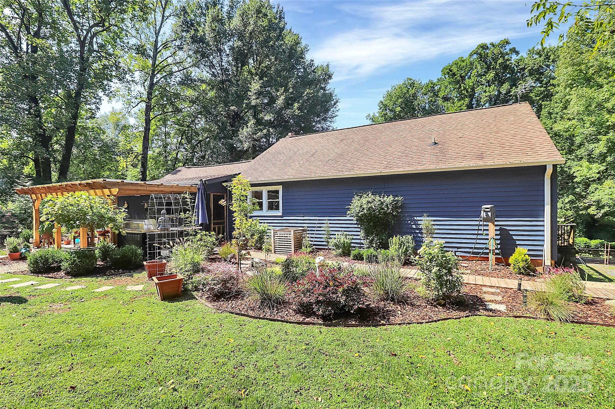 205 Mason Street Belmont, NC 28012 - Photo 24 of 27 a front view of house with yard and green space
