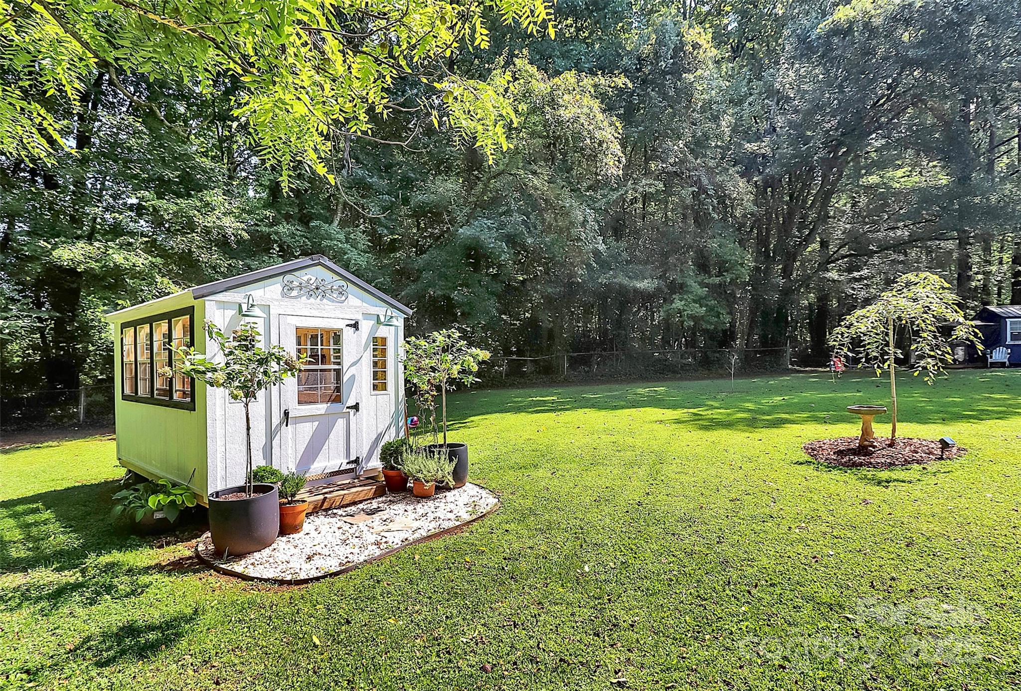205 Mason Street Belmont, NC 28012 - Photo 26 of 27 a front view of a house with garden