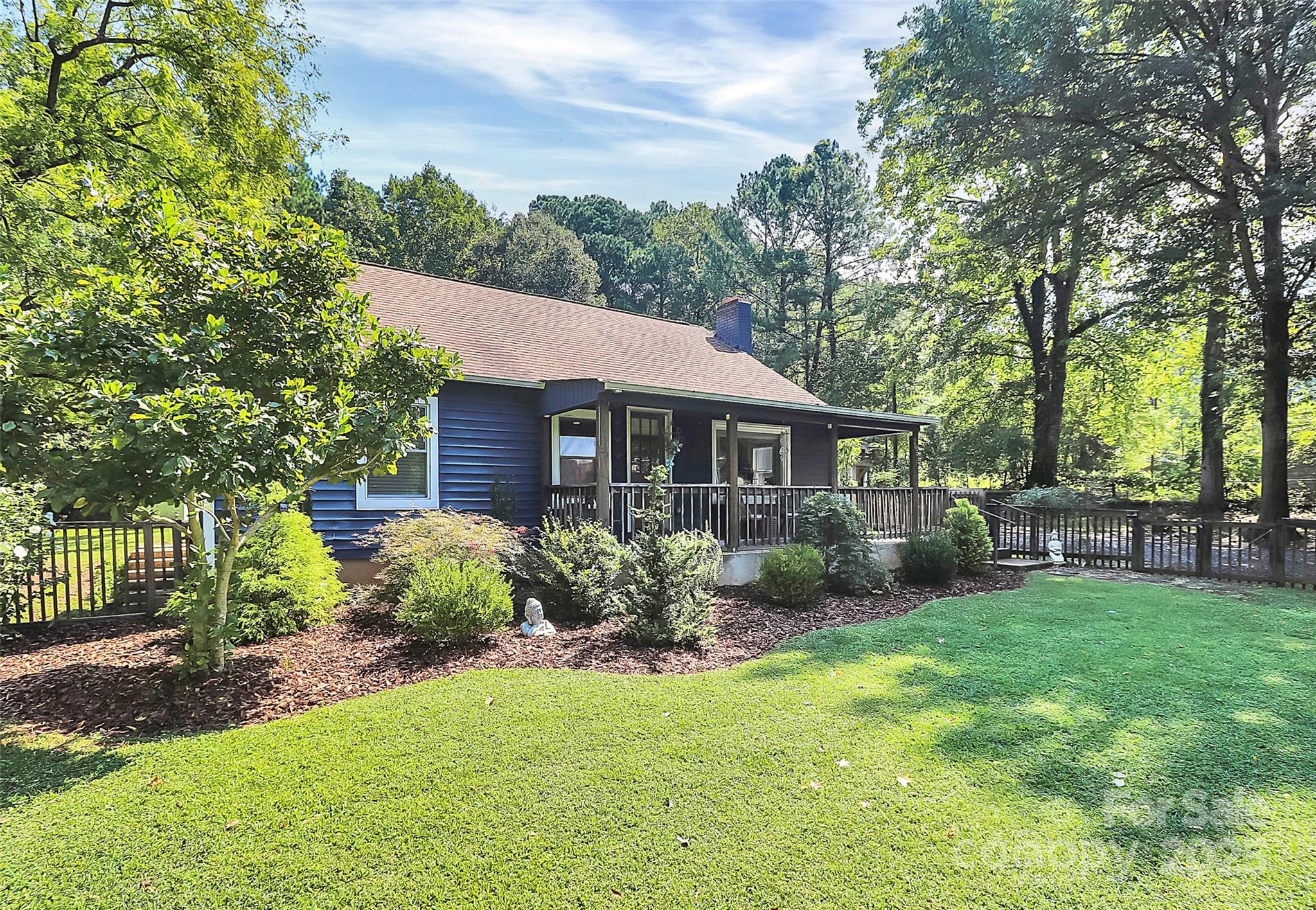 205 Mason Street Belmont, NC 28012 - Photo 3 of 27 a view of a house with a yard and sitting area