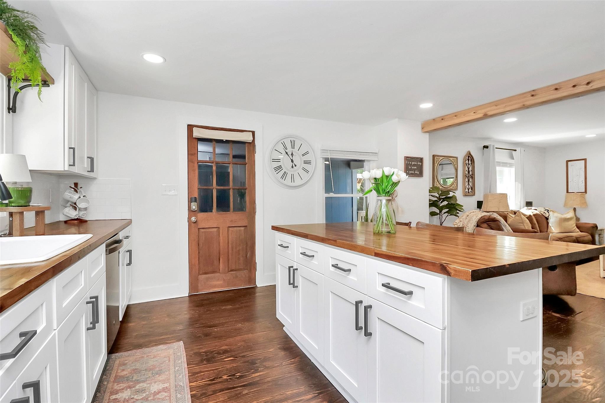 205 Mason Street Belmont, NC 28012 - Photo 4 of 27 a kitchen with counter top space sink and stove