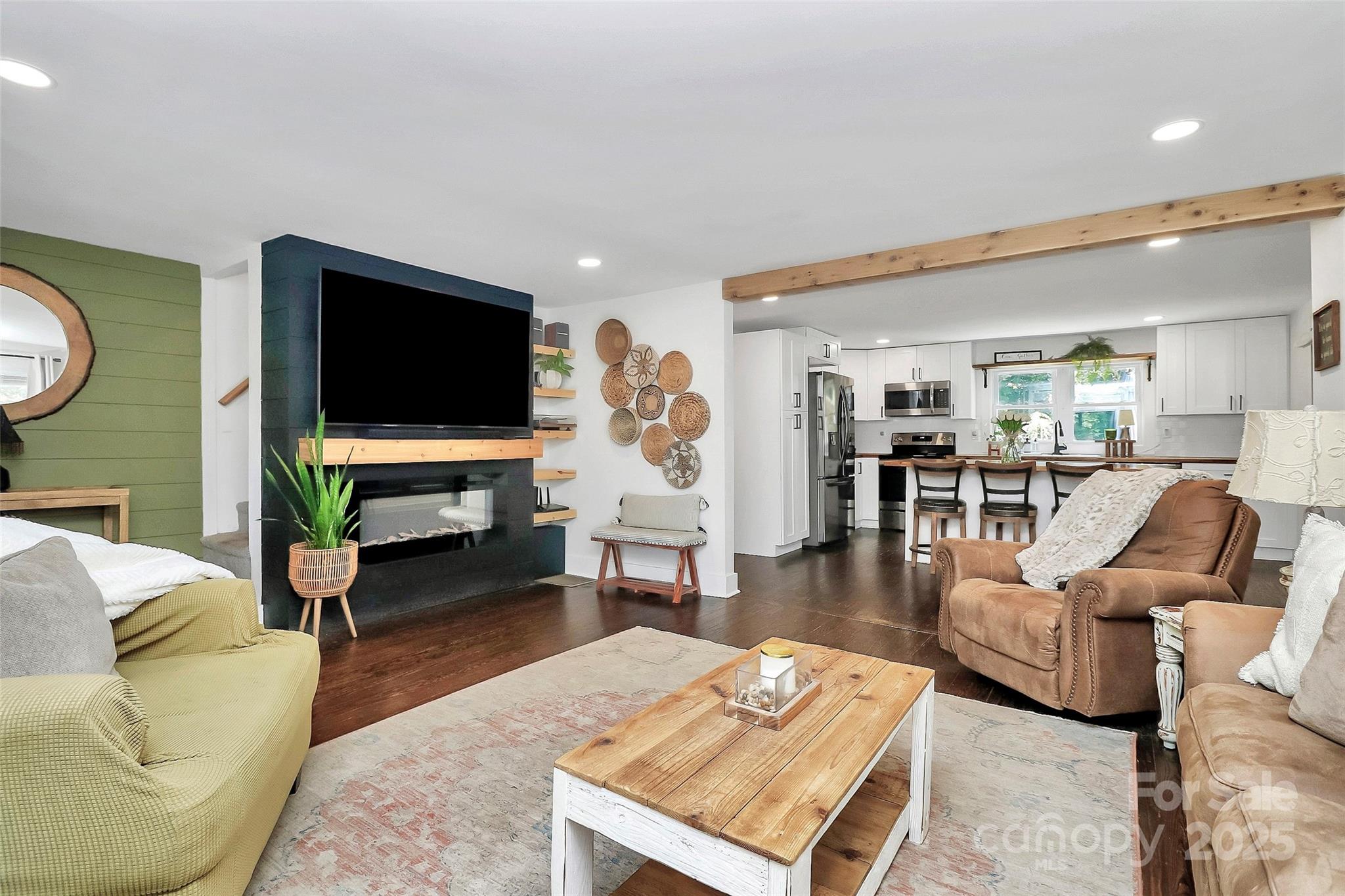 205 Mason Street Belmont, NC 28012 - Photo 10 of 27 a living room with furniture and a flat screen tv