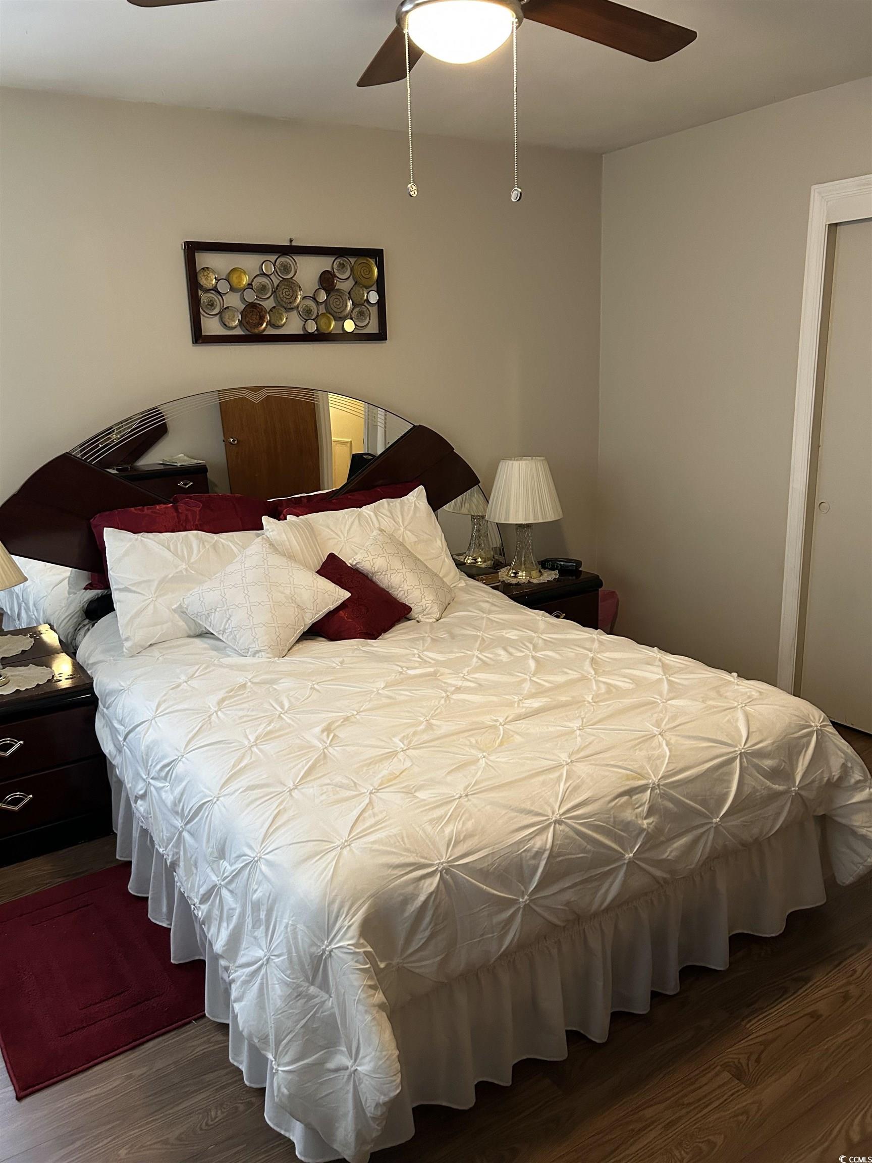 1411 East Harrison Street Dillon, SC 29536 - Photo 33 of 40 Bedroom with wood finished floors and a ceiling fan