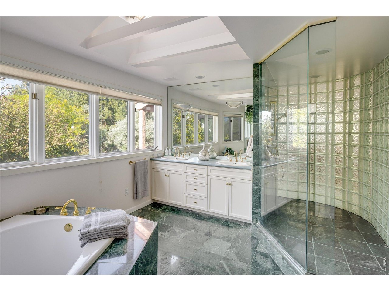 495 South Cedar Brook Road Boulder, CO 80304 - Photo 24 of 40 Light-filled 5 piece primary bathroom