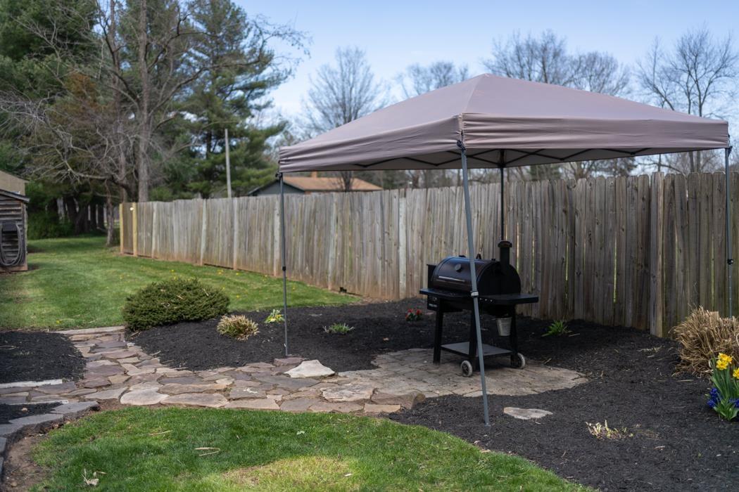 1151 George Walton Road Mount Solon, VA 22843 - Photo 54 of 65 a backyard of a house with yard barbeque oven and outdoor seating