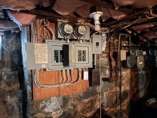 203 Lexington Street Boston, MA 02128 - Photo 21 of 24 a view of a water heater room