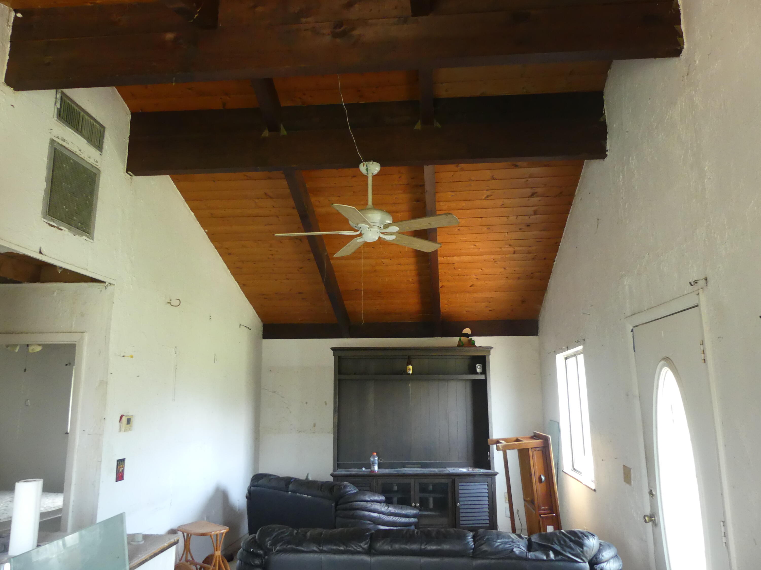 6633 Rigger Road Lake Worth, FL 33462 - Photo 15 of 28 a room with furniture
